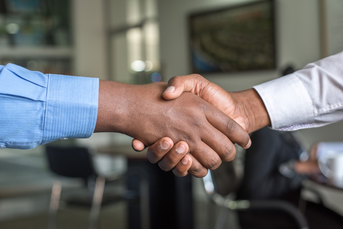 Attorney handshake — personalized legal strategy for every family